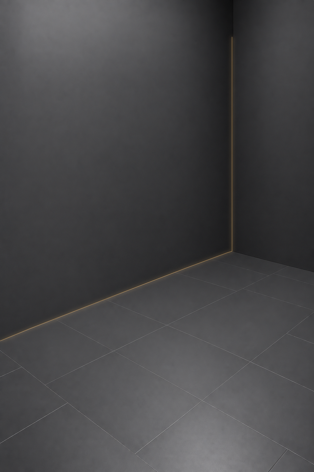 An empty graphite studio with an amber architectural seam, sharing the camera and room of the engineering study.